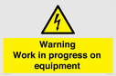 warning-work-in-progress-on-equipmentwith-electrical-hazard-symbol~